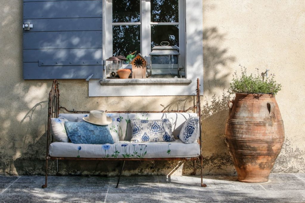 Outdoor sofa in patio at la Baye des Anges